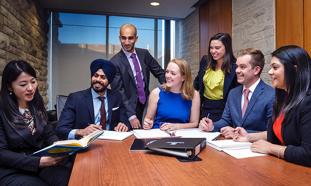 MBA students in boardroom