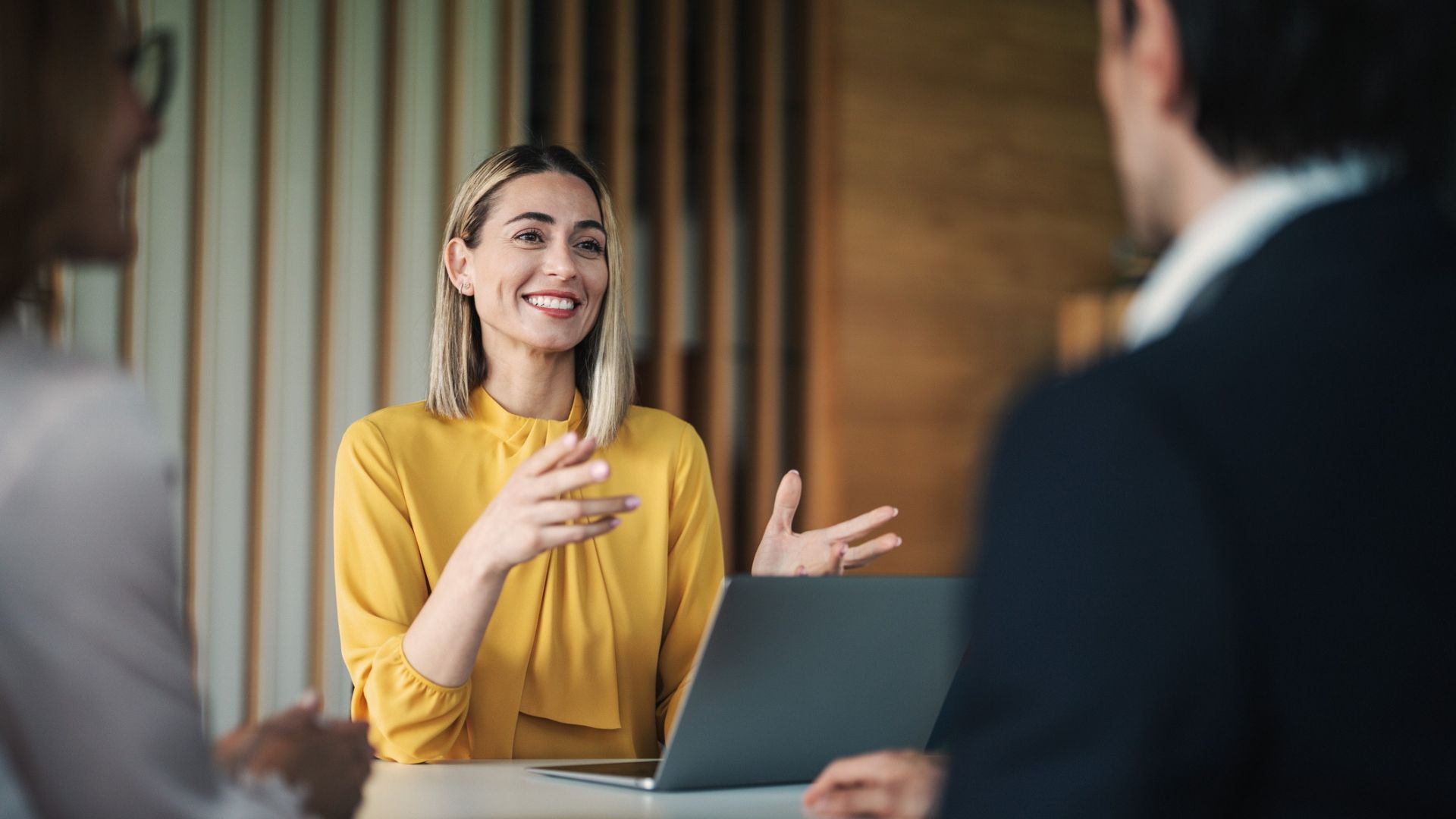 Woman founder pitching business to potential funders