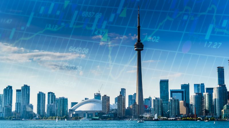 Stylized photo illustration of Toronto Downtown waterfront with overlay of abstract financial chart data.