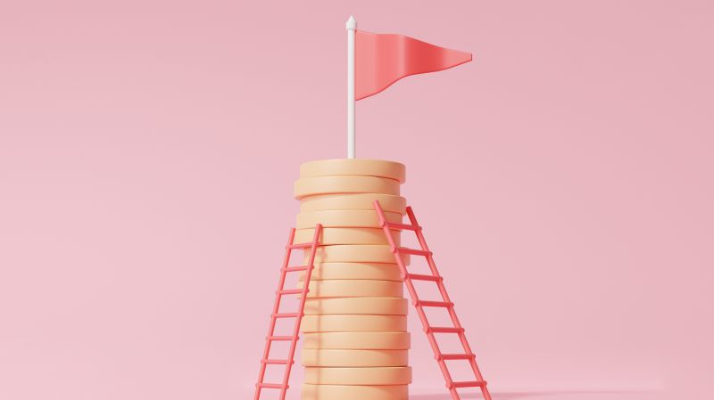 Coins with flag on pink background. 