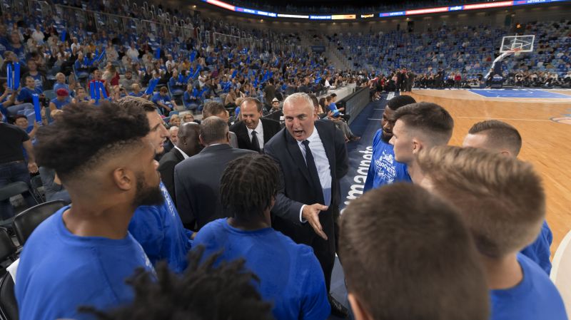 Basketball players shaking hands with coach at the end of the game at Arena Stozice, Ljubljana, Slovenia