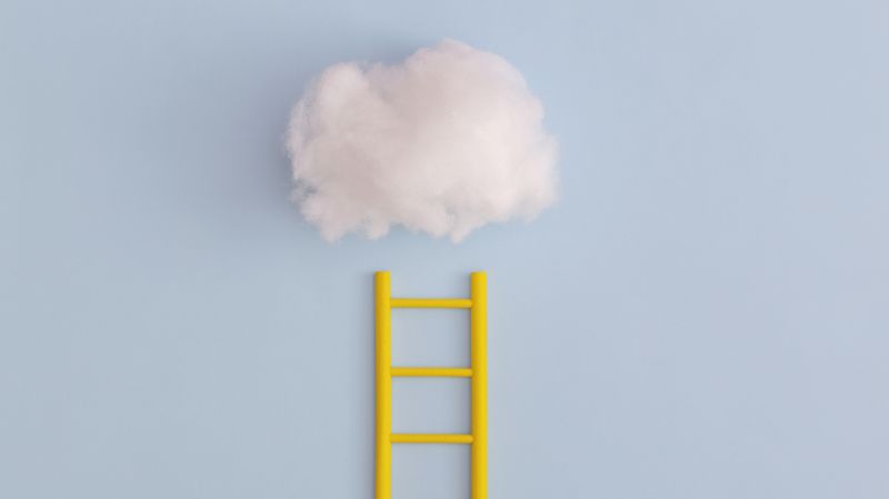 Yellow ladder leading to the cloud, blue background