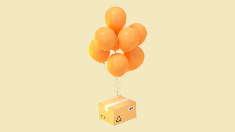 A light yellow package carried by yellow balloons. Yellow background.