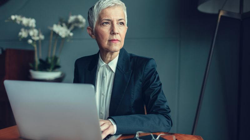 Portrait of mature businesswoman sitting in her office