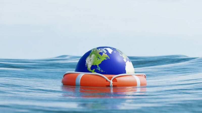 Life saver in the sea with a miniature version of Earth in it.