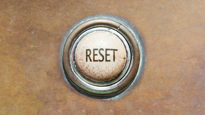 Image of an old button - reset.