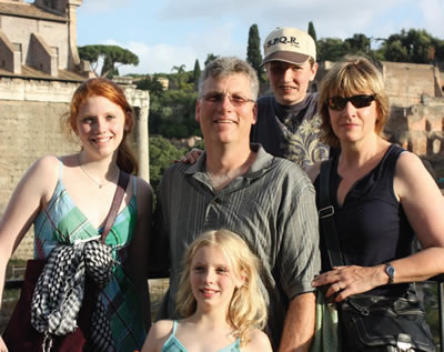 Michael Nowlan (centre) and his wife Elsa vacationing in Rome with their family: eldest daughter Katharine (photo left), daughter Sarah (centre front) and son Alexander (centre back).