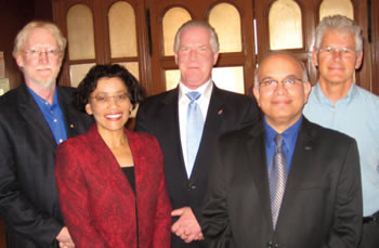 From left, Brent Gallupe, Associate Dean and past Director of The Monieson Centre; Yolande Chan, its current Director; Michael Hawes, Executive Director, Canada-US Fulbright Program; Rajiv Sabherwal, Fulbright Scholar; and Jim McKeen, also a past Director of the Centre.