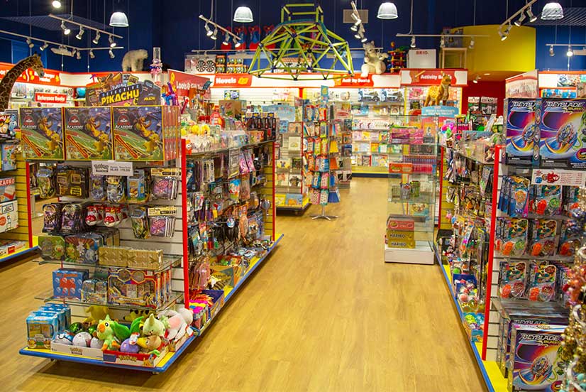 Stocked shelves inside a Mastermind Toys store