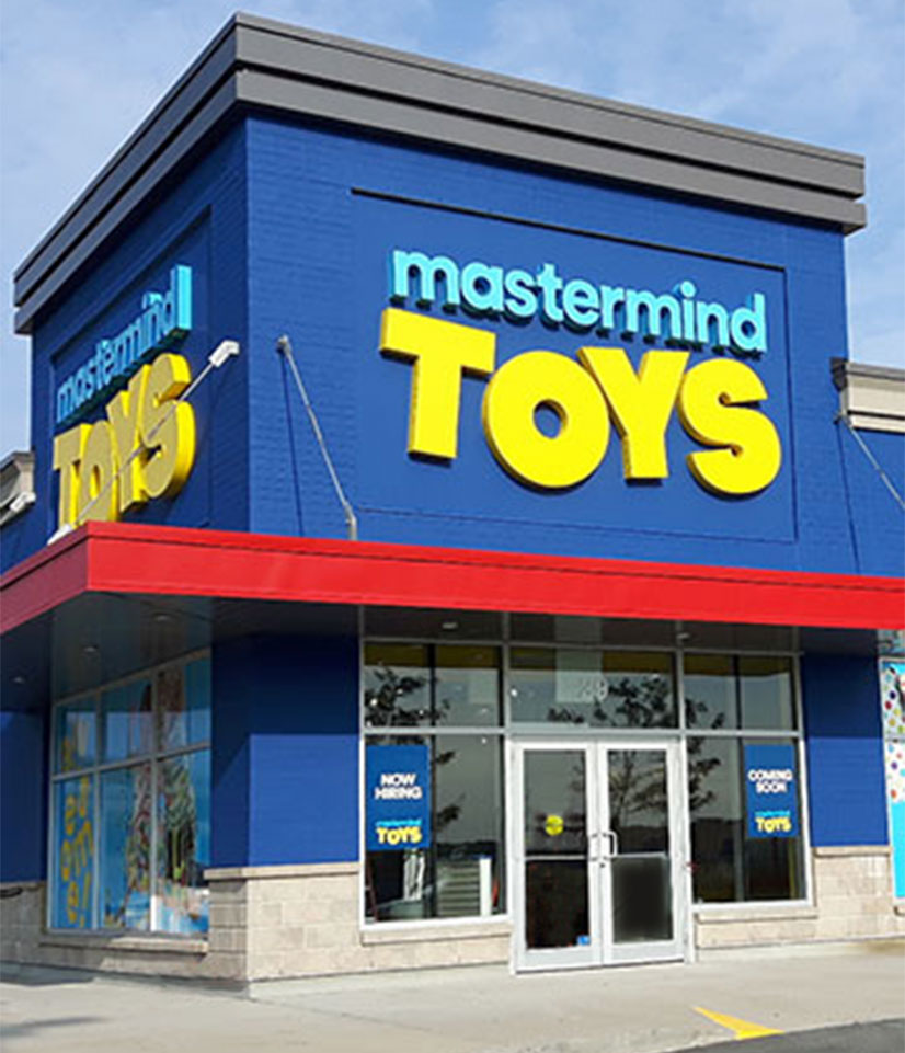 A brightly painted exterior of a Mastermind Toys store