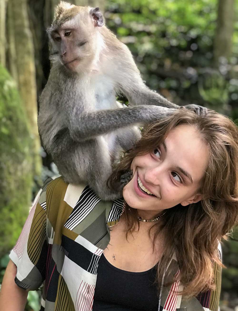 Paisia Warhaft with a monkey on her shoulder