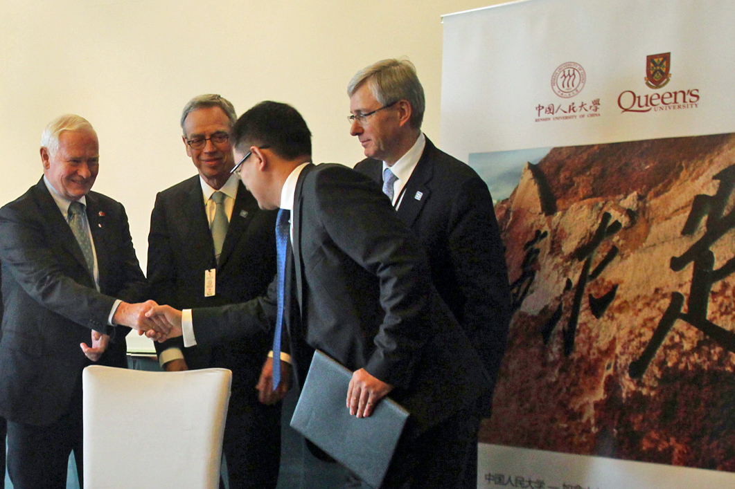 A Letter of Intent governing the program had been signed at a ceremony in Beijing in October, with various dignitaries in attendance. Governor General David Johnston, LLB’66, shakes hands with Dr. Zhigang Qiu, Assistant Dean, Hanqing Advanced Institute of Economics and Finance. Also pictured are Joe Oliver, the Minister of Natural Resources (second from left) and Guy Saint-Jacques, Canada’s Ambassador to China.