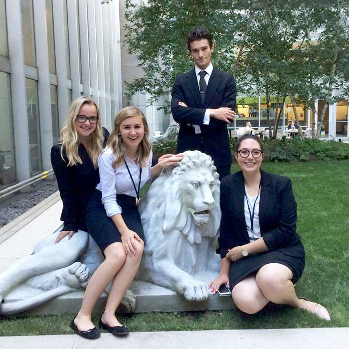 Taming the competition in New York: (l to r) Queen’s GDB 2015 students Taylor Warren, BSc(Biology)’15; Fiona Logue, BSc(Chemistry)’15; Matthew Wilkings, BA(Philosophy), UWO; and Hanna Sands, BCom & BA, University of Calgary. 