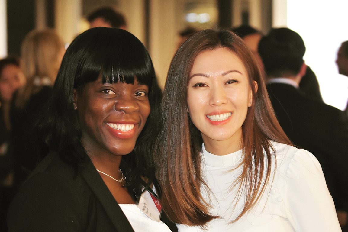 At a SWIF event in November: Neisely Eugene, MFin'18, (left) and Yulia Shin, MFin'19