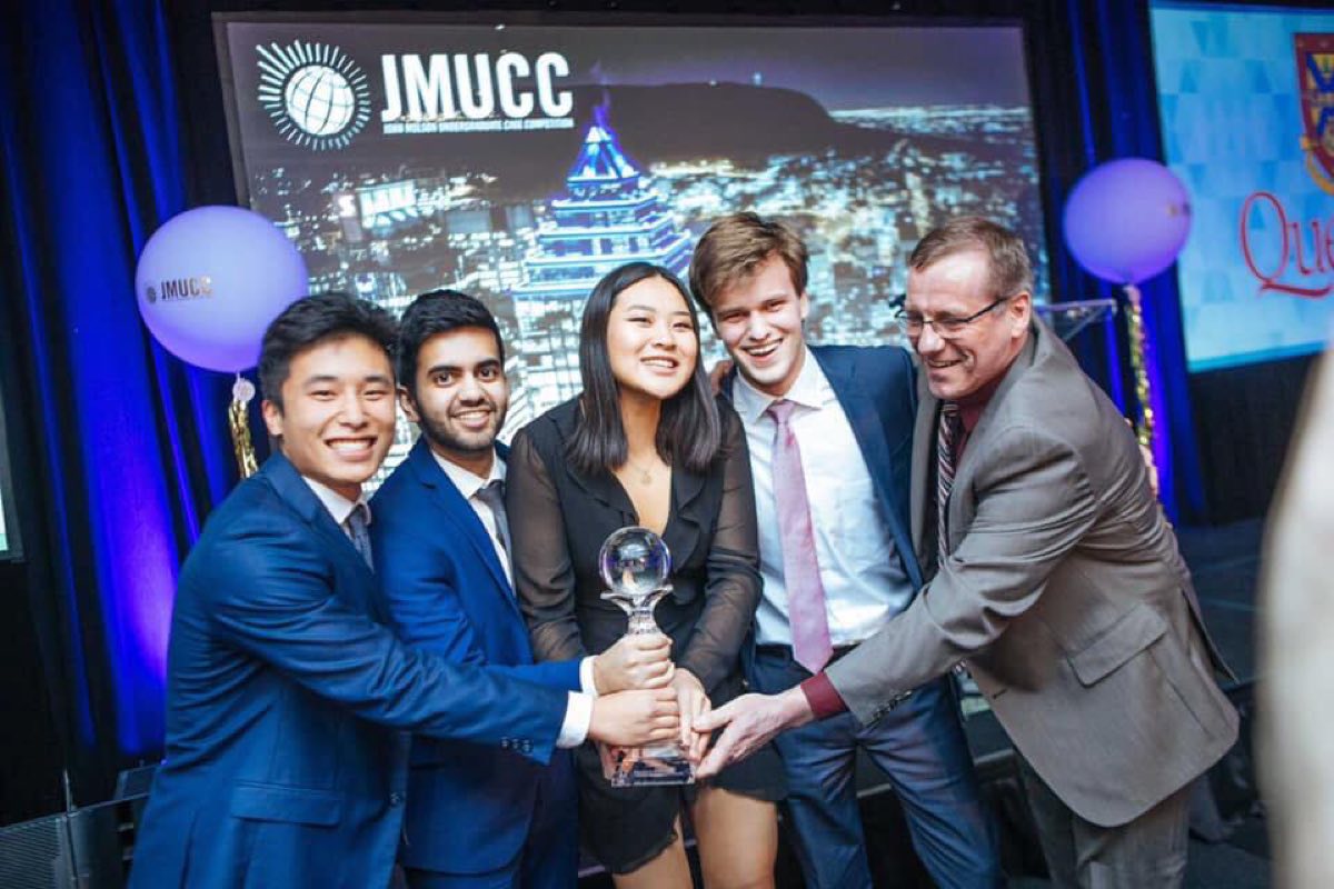 Students celebrating a win at a case competition