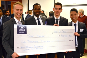 Congratulations to Team Alpha, from left:  Simon Campbell, Errol Muirhead, Brandon Hewitt, Steven Wu, all Queen’s Master of Management Analytics Class of 2016 students, winners of the 2015 IBM-Smith “Business Value with Analytics” case competition.