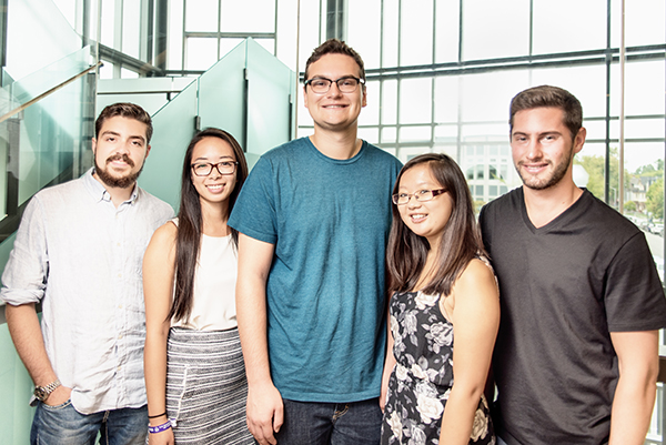 The first BCom/JD students – Zac Cooper, Diane Wu, Josh Sherkin, Jennifer Mak and Daniel Baum – shown in the Queen’s Law atrium are experiencing the “best of both worlds” in the combined program. (Photo by Andrew Van Overbeke)