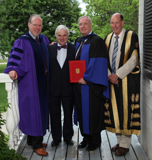 Dean David Saunders, the Honourable Peter Milliken, House of Commons Speaker and Kingston MP, The Right Honourable Paul Martin, and Queen’s Chancellor David Dodge