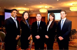 Queen’s Commerce team, from left, Som Ghosh, Ellen Xue, faculty advisor Philip Osanic, Donna Yan and Samuel Battista