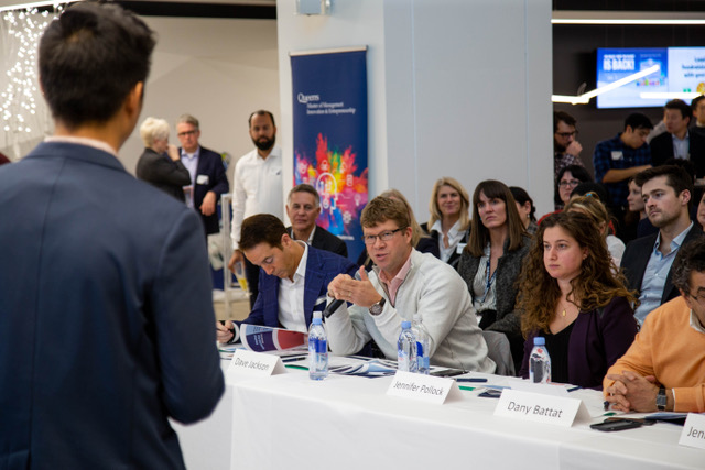 UPstart judge David Jackson, BCom’91, offers feedback to Eric Zhang, MMIE’18, of Pastel Special Education during his pitch.